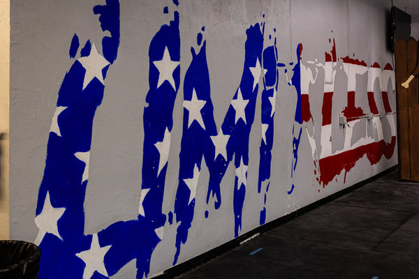 Red, White And Blue Limitless gym wall mural featuring strength artwork