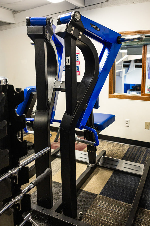 Shoulder press machine in weight training area