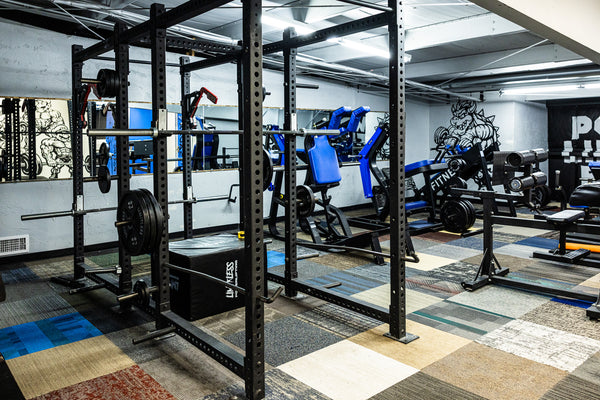 Heavy-duty power racks in main lifting area