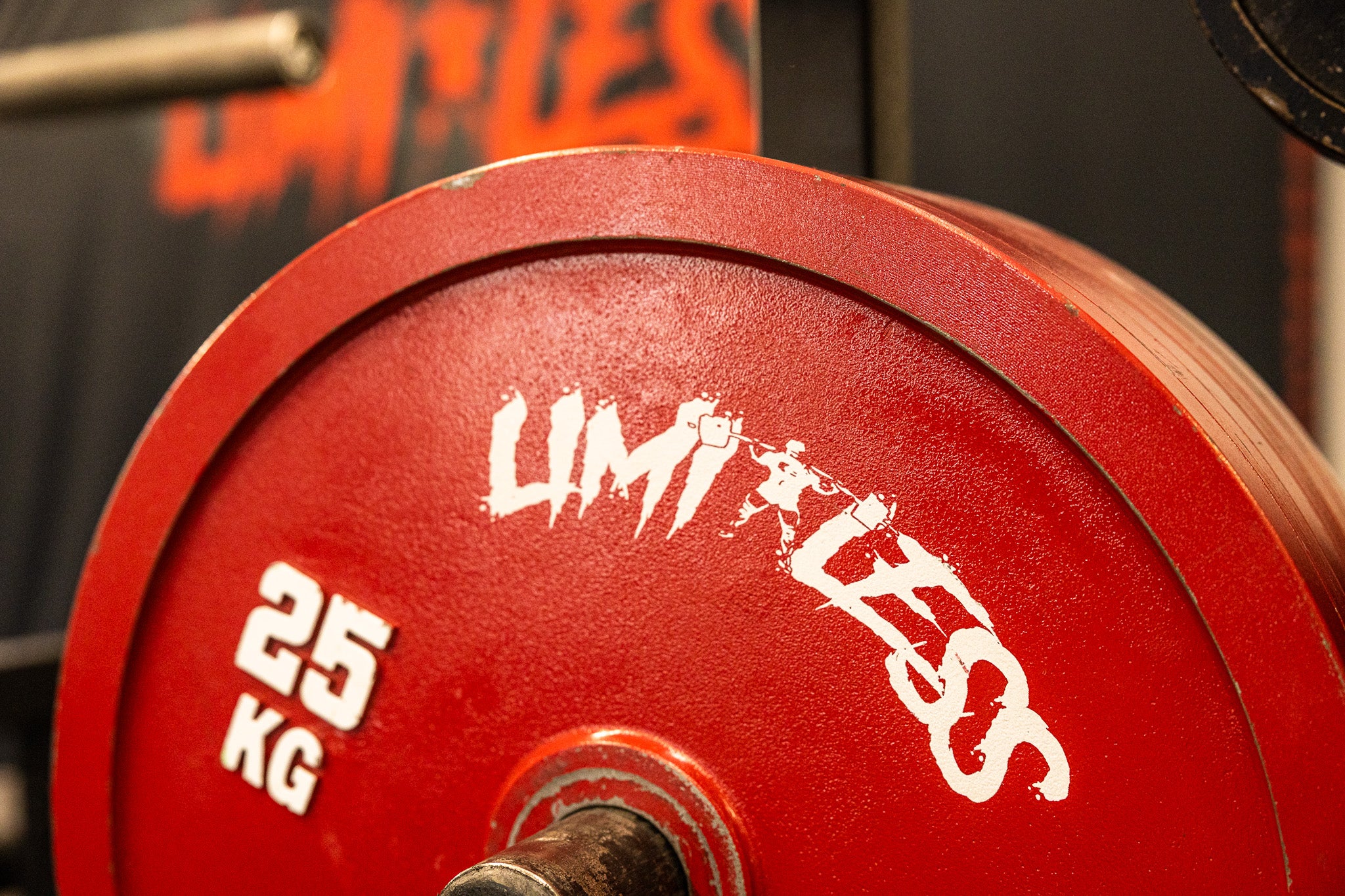 Closeup of Limitless branded red calibrated plate