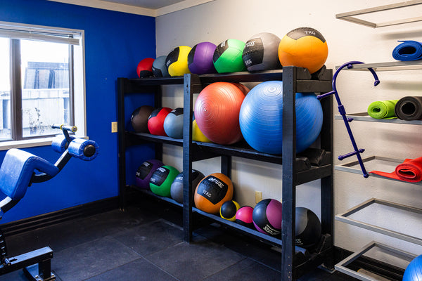 Rack of stability balls in the functional training section