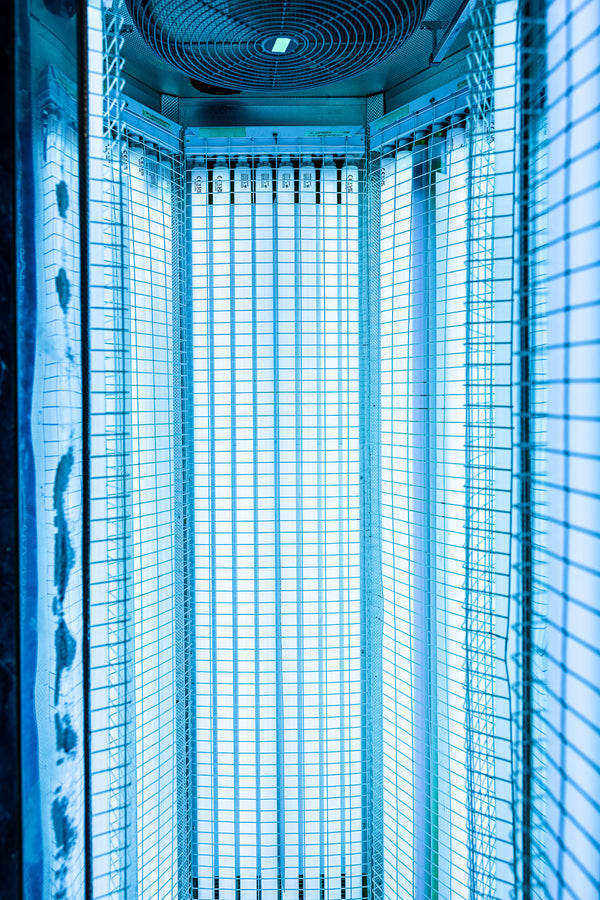 Interior view of standing tanning booth close up